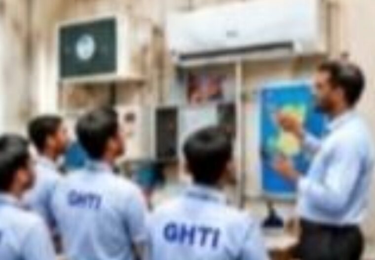 GHTI trainer taking a classroom session with uniformed students